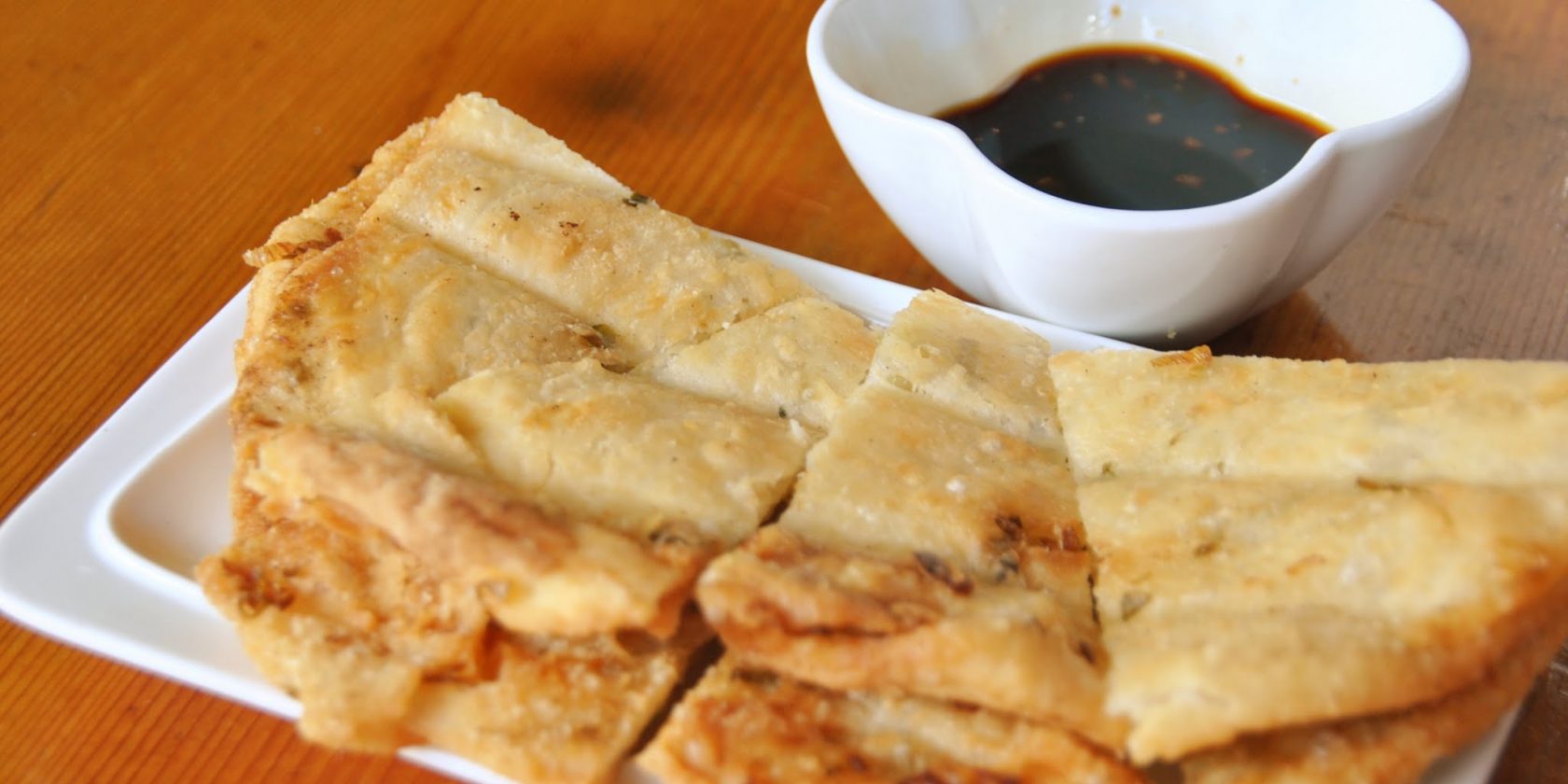 A22. 葱油饼 		Scallion Pancake