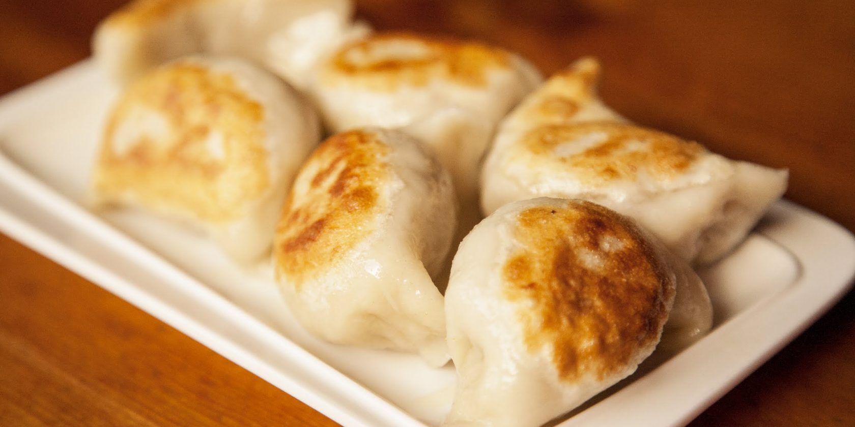 A25. 牛肉煎饺 	Beef Dumplings