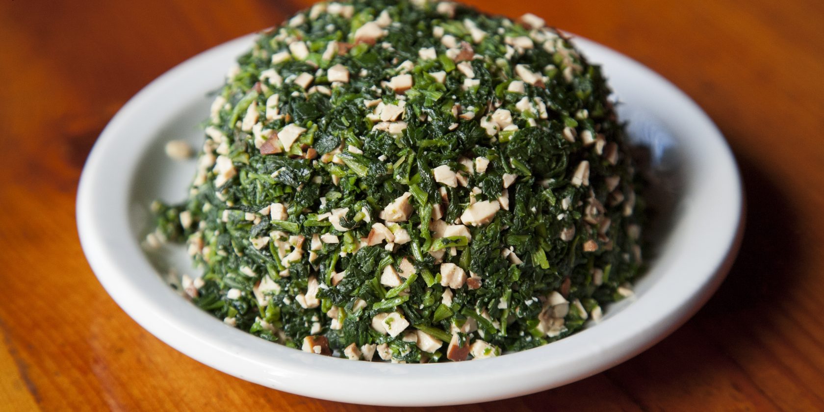 A8. 香干马兰头 	Wild Veg. and Bean Curd